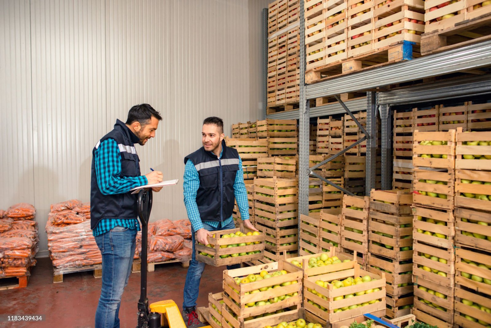 Two workers loading in the warehouse